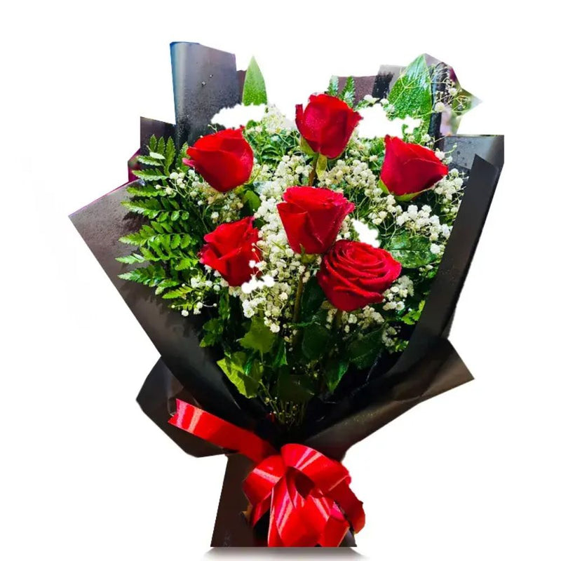 Half dozen red roses with seasonal fillers