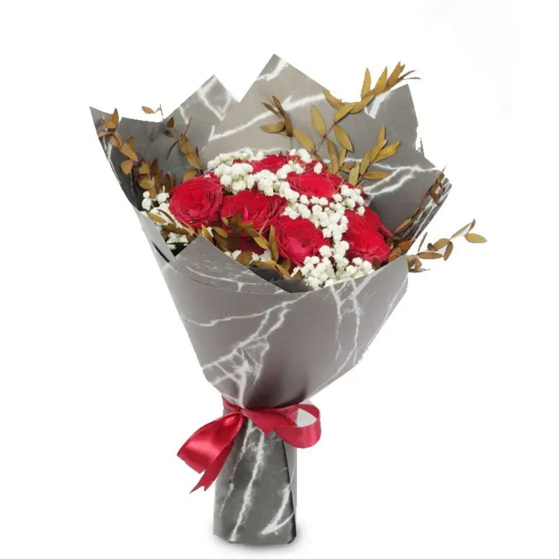 Arrangement of 10 red roses in a bouquet