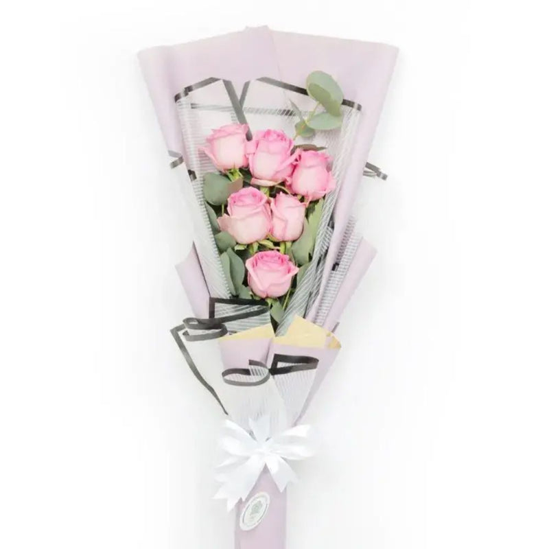 Surprise arrangement of 6 pink roses
